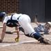 Mattawan freshman Genevieve Soltesz on the ground after scoring in the game against Saline on Tuesday, June 11. Daniel Brenner I AnnArbor.com